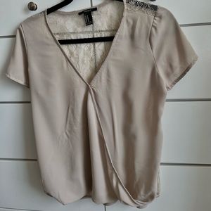 Forever 21 Blouse in a cream color in a size M with a lace back fabric